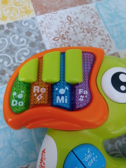 Zabawka dla dzieci papuga edukacyja