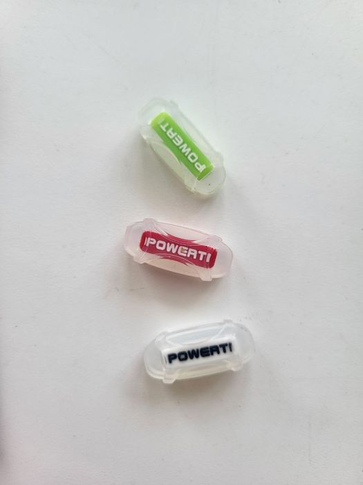 Виброгаситель для большого тенниса на ракетку