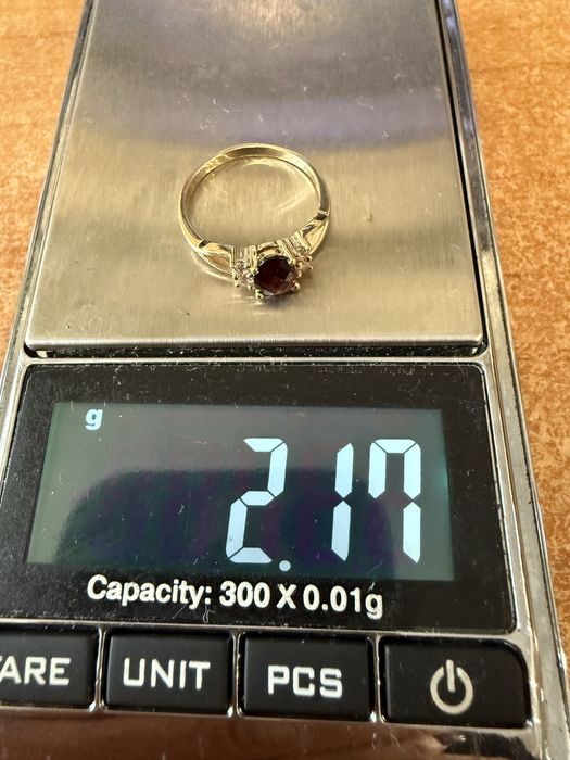 Золотий набір з гранатами