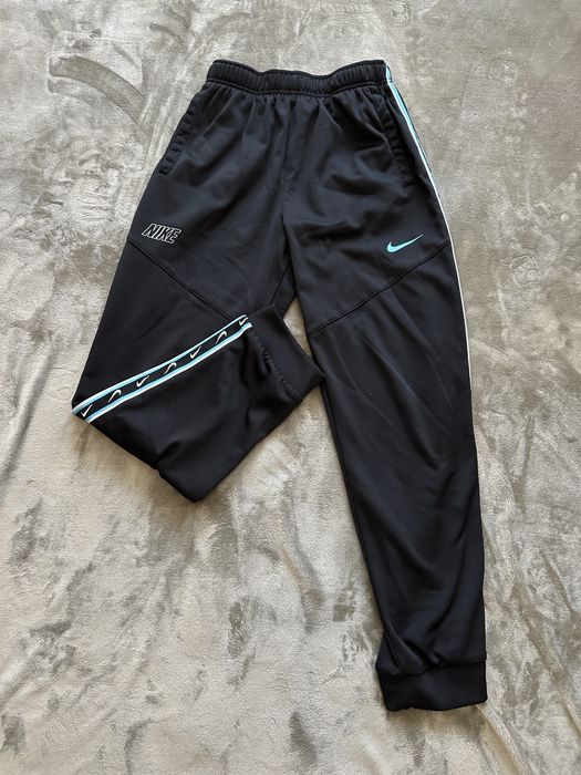 Штани Nike на лампасах