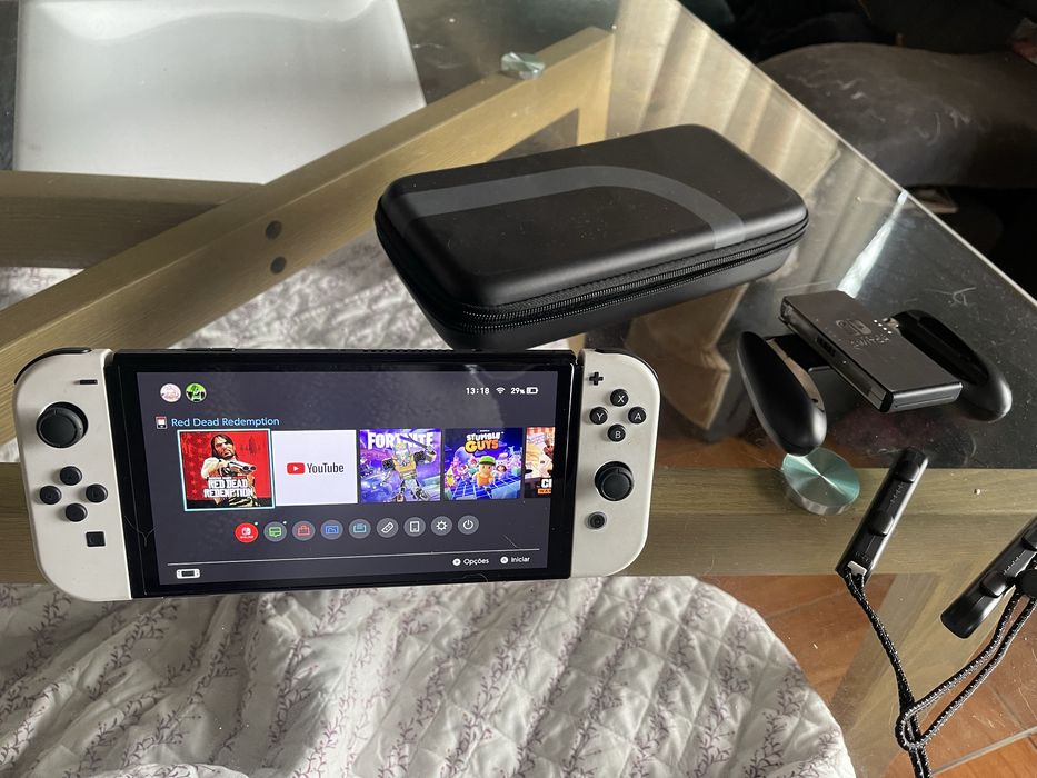 Nitendo switch oled com 1 mes de uso