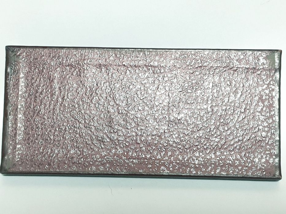 Antigo calendário perpétuo francês revestido de couro