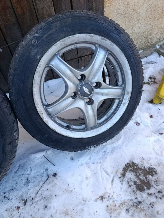 Продам зимову гуму на титанах 155-65 R14 .