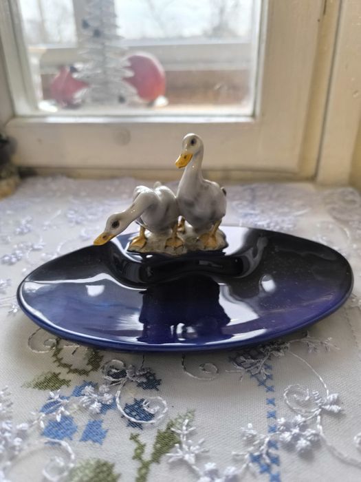 Тарілка з гусями