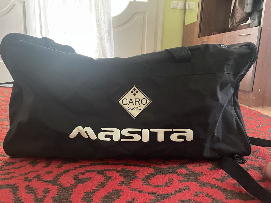 Дорожні сумки великого розміру