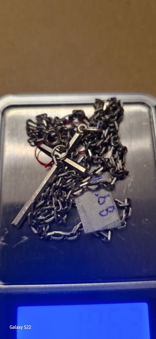 Łańcuszek z krzyżkiem 10,67 gram.68 cm dłu