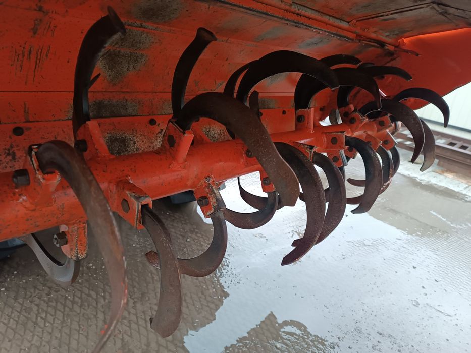 Японський мінітрактор . Трактор Кубота.