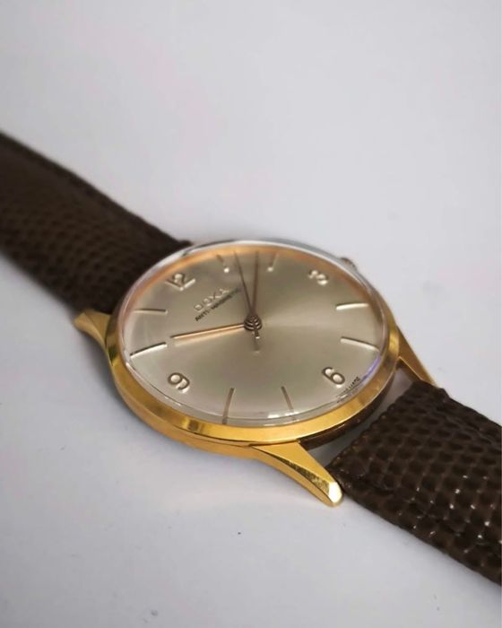 Doxa meski mechaniczny zloto 1953r idealny