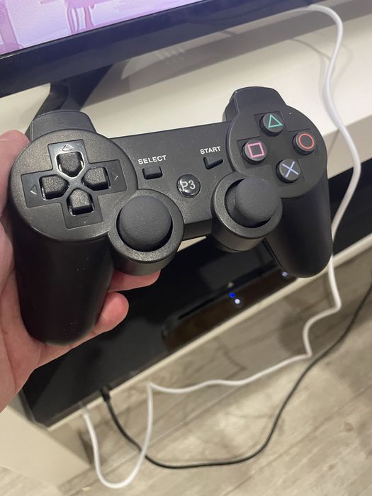 Playstation 3 Slim + 14 jogos + comando + cabos