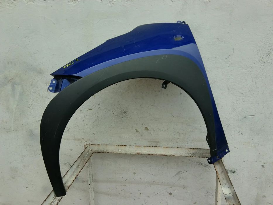 TOYOTA AYGO X CROSS BŁOTNIK LEWY PRZÓD PRZEDNI NAKŁADKA BŁOTNIKA