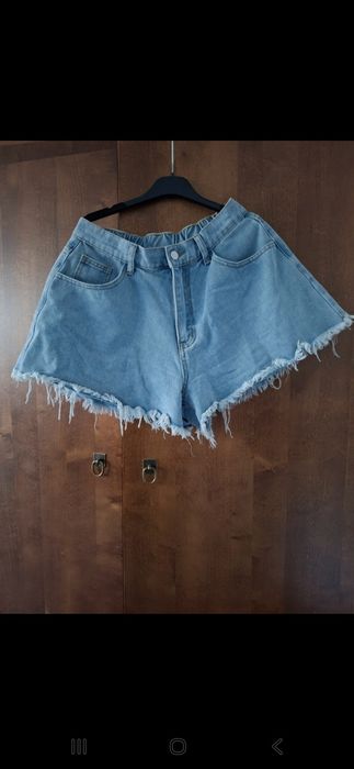 Rozkloszowane spodenki mochy jeansowe