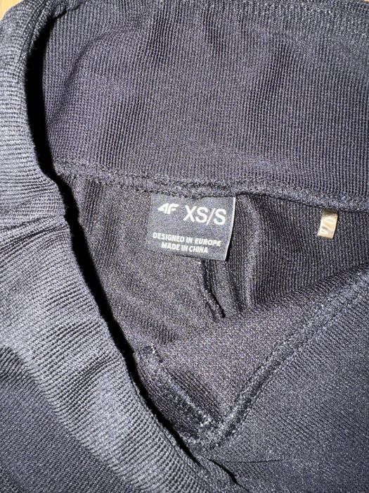 Czarne legginsy 4F