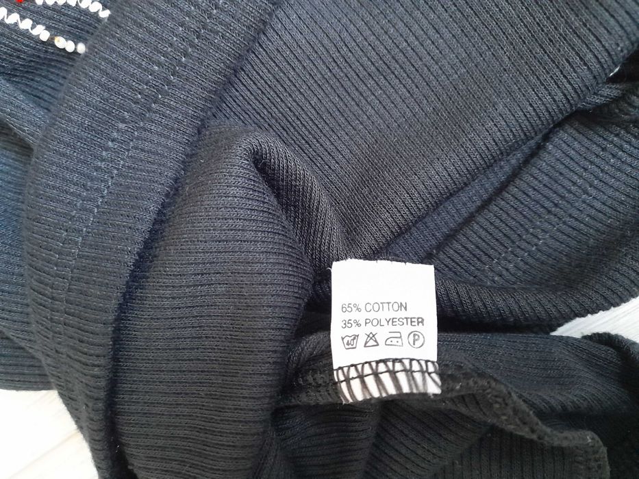 Czarny sweter damski wzór folk kwiaty haft bawełna pachy obwód 81 cm