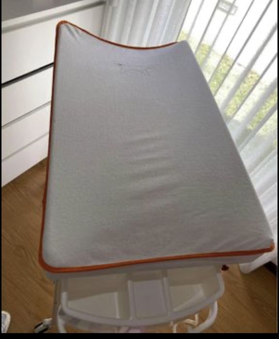 Fraldario com banheira