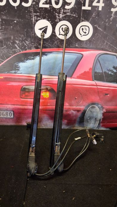 Амортизатор Електро Привід кришки багажника Opel Insignia 13338838