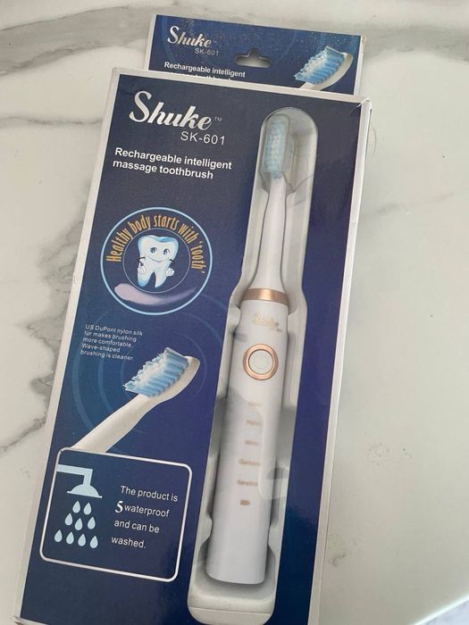 Електрична зубна щітка