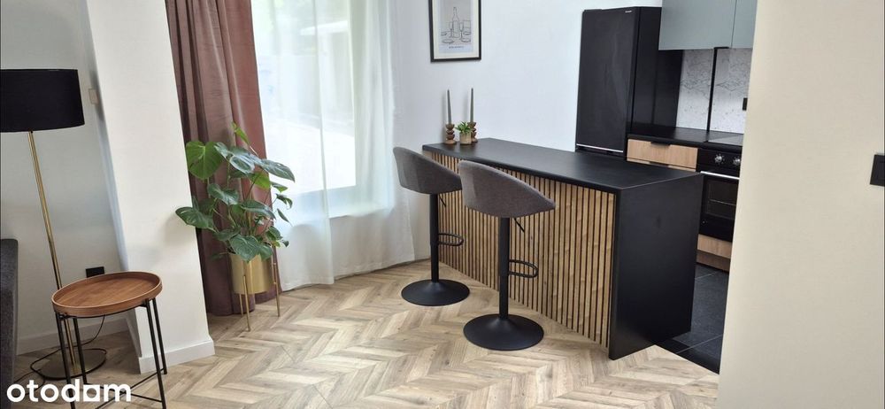 WYJĄTKOWY APARTAMENT z ogródkiem i przestronnym tarasem.