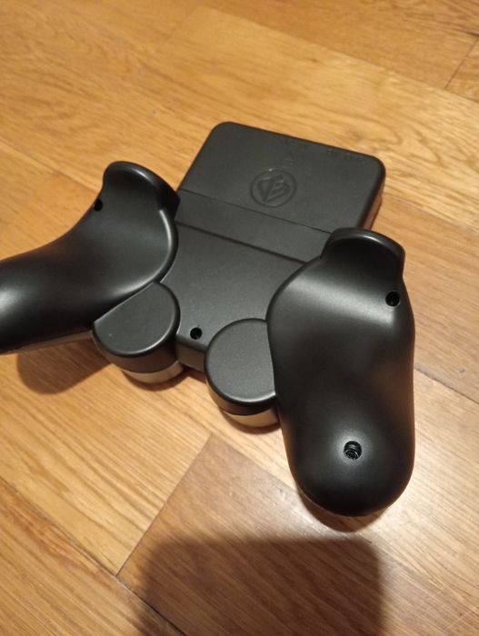 Portable Retrovision S10 gaming console with 500 games64284483823489122