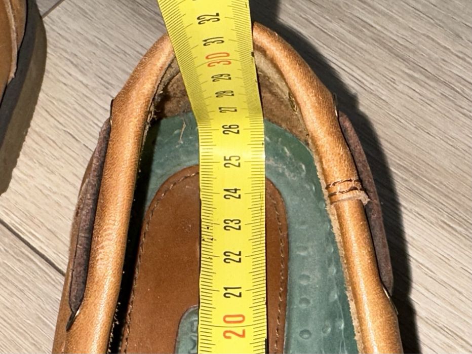 Шкіряні топсайдери Lacoste