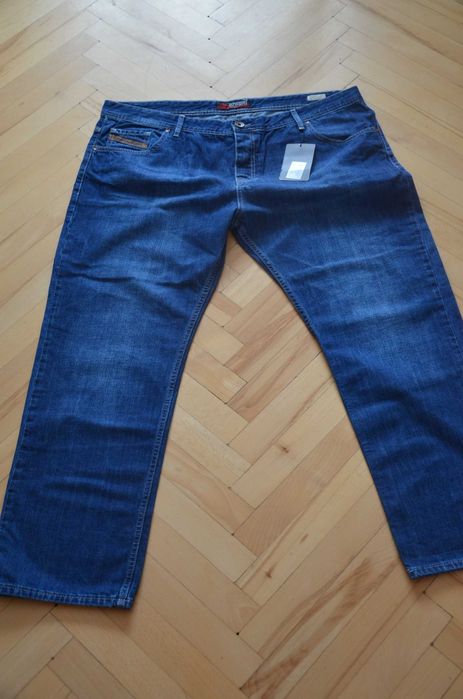 Spodnie dżinsy jeansy Alessandro Salvarini W42 L30 nowe z met. granat