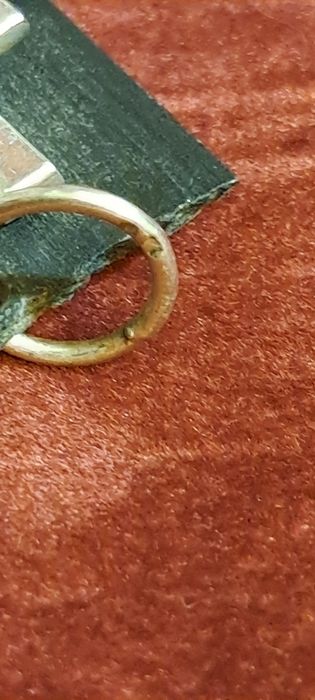 Pendente Raro em prata contrastada.