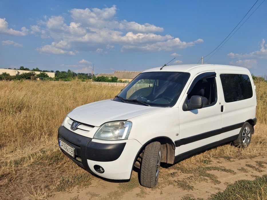 П е ж о  партнер