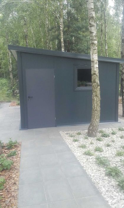 Hala stalowa garaż ocieplany magazyn konstrukcja płyta warstwowa dach