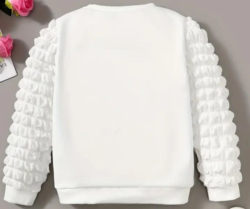 Sprzedam sweterek biały  dzieciecy roz 98-104