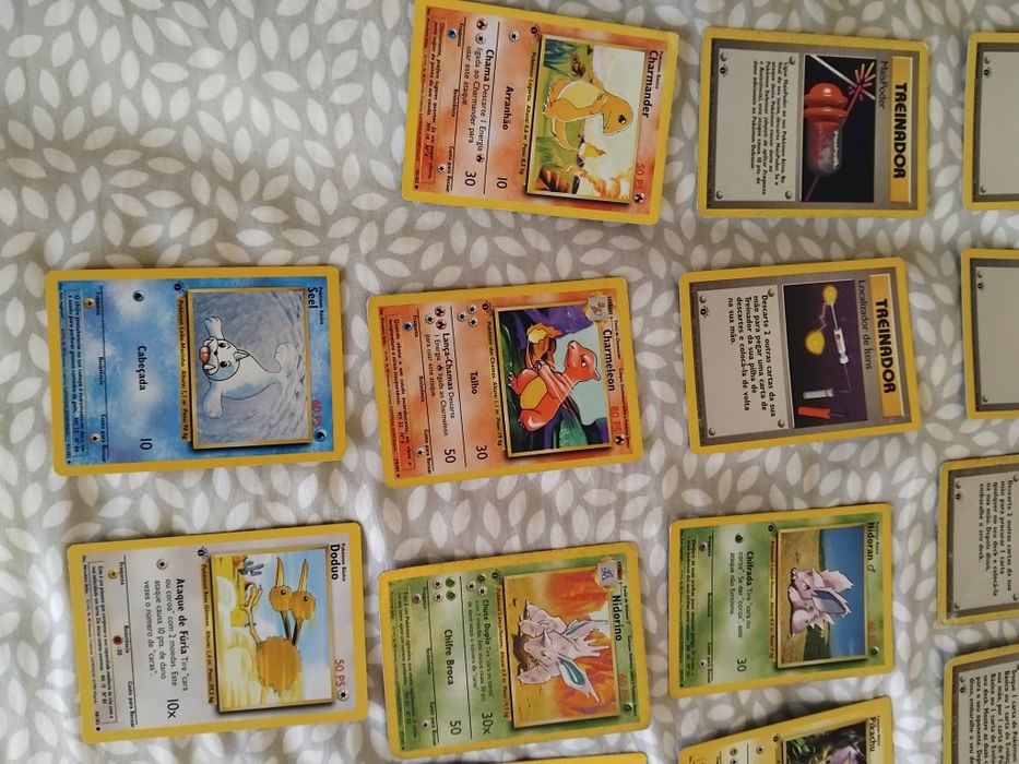 22 cartas pokemon originais 1a edição portuguesa  (pikachu,charmander)