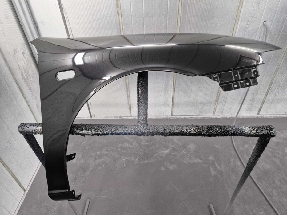 Błotnik lewy SEAT LEON I / TOLEDO II 98-06 KOLOR LC9Z czarny
