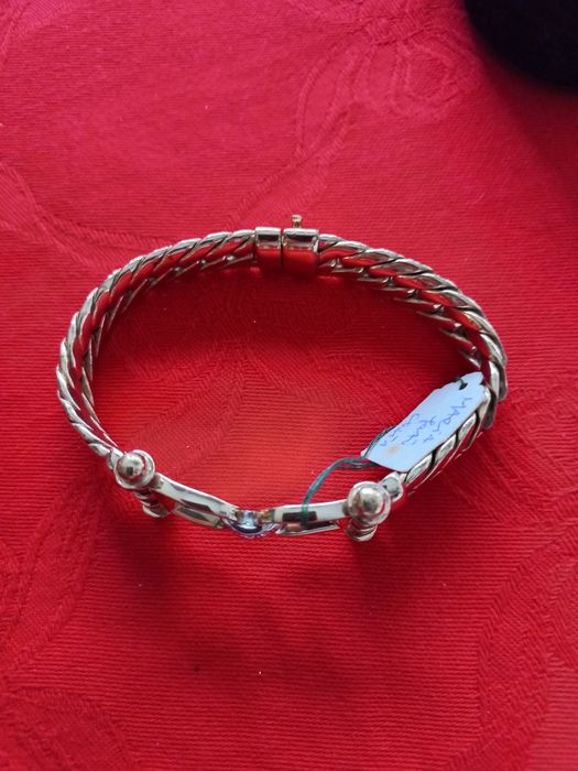 Pulseira  dourada com brilhantes  marca Shock