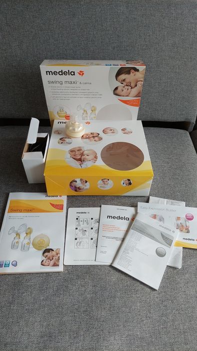 Laktator Medela Swing maxi podwójny na dwie piersi & calma