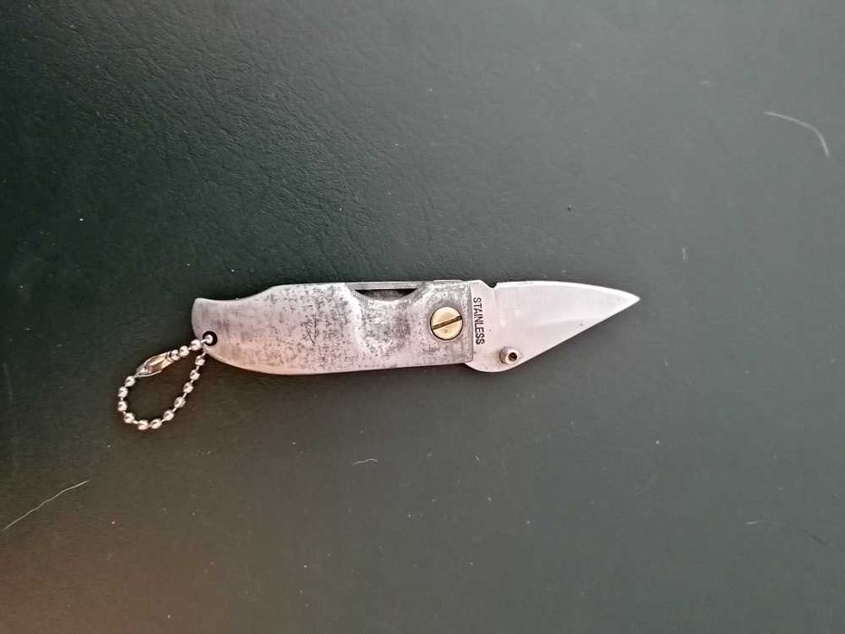 Canivete em aço inox com punho em estanho