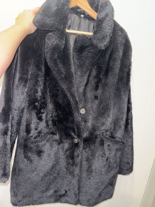 Casaco de pelo preto