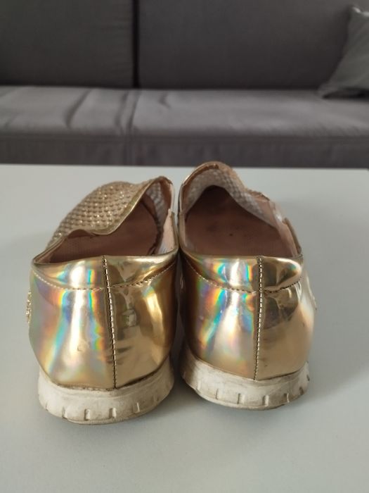 Buty damskie złote płaskie.
