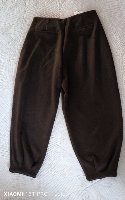 Spodnie wełniane od Zara, M