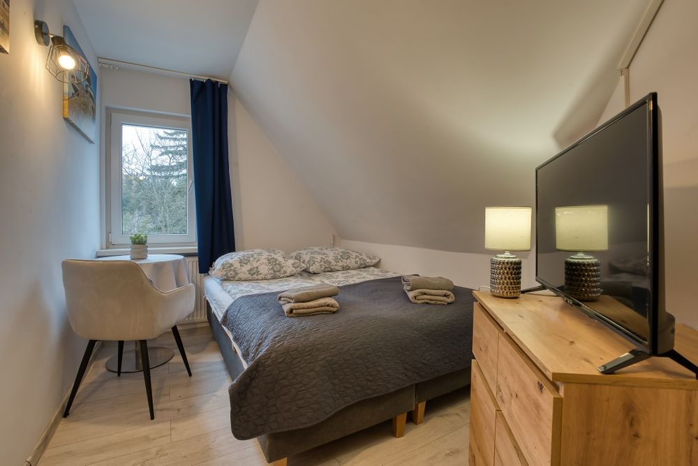 Tanie pokoje w centrum, balia, parking, ogólnodostępna kuchnia.