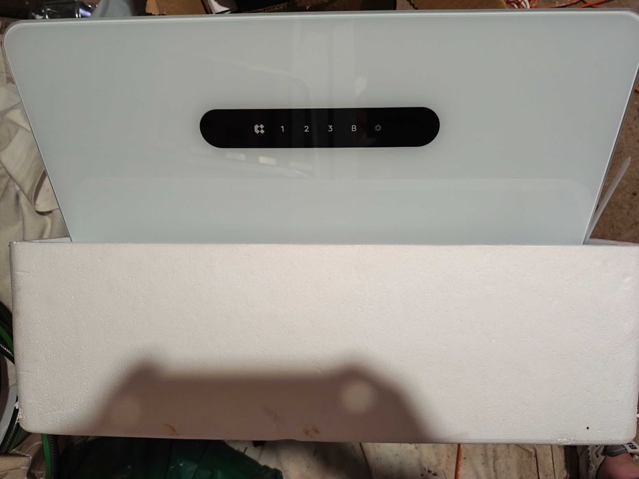 Exaustor novo, ainda na caixa