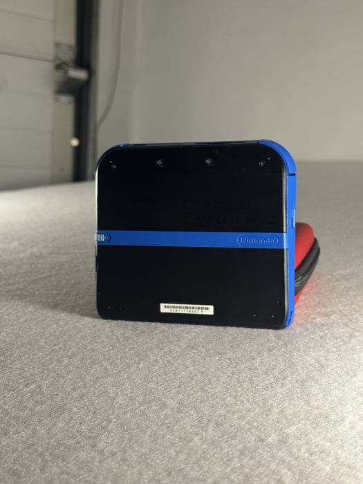 Nintendo 2DS czarno-niebieski + etui – sprawny