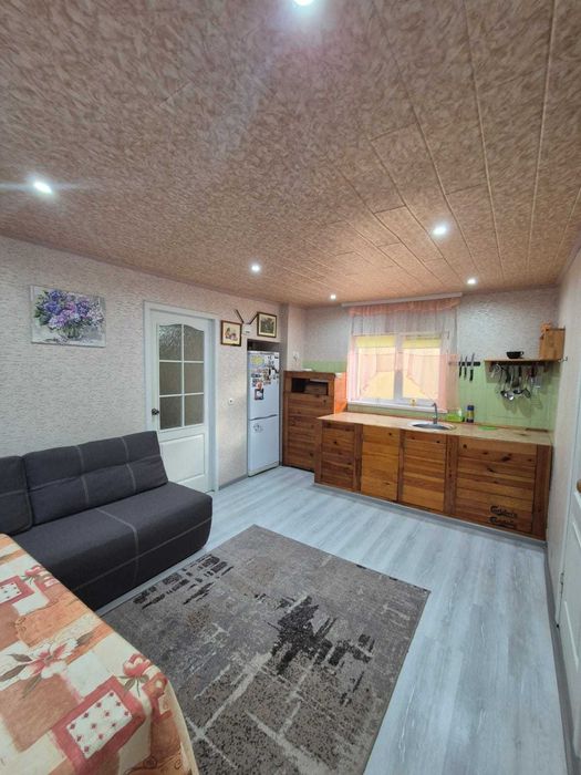 Продам 1 ком.квартиру Салтовка Кулиничи 35м2 со своим двором  участком и гаражом 20000у.е.