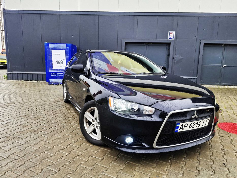 Митсубиши Лансер Х