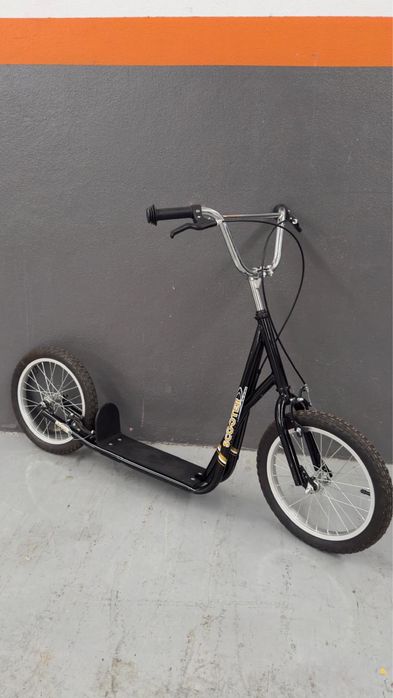 Trotinet em otimo estado .