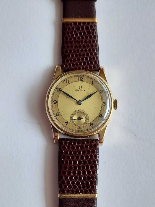 OMEGA złota lata 20-te
