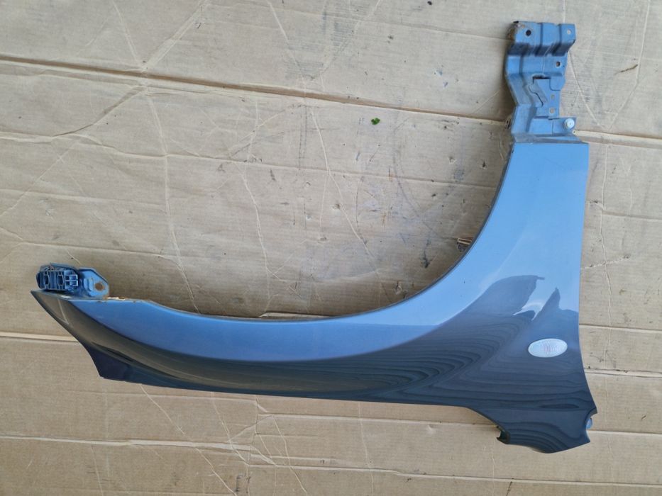 Błotnik pasażera prawy przedni przód Suzuki Grand Vitara II kolor ZDL