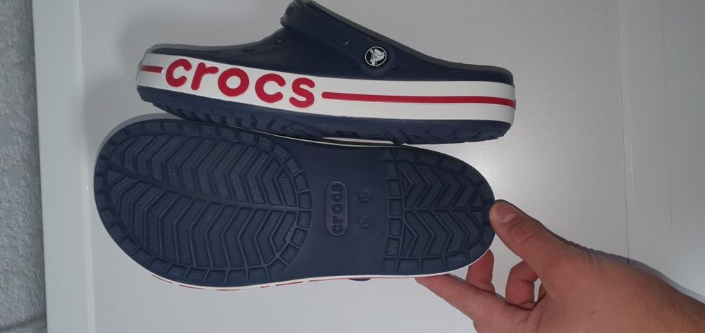Нові Crocs тапочки оріг