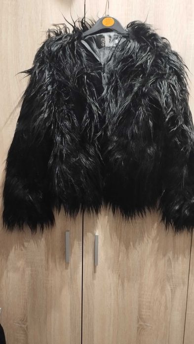 Casaco de pelo preto
