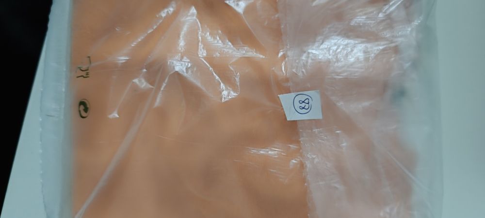 T-shirt de menina. Cor: laranja