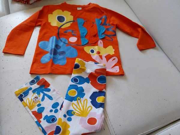 Pack de roupa da marca Tuc Tuc em tons de vermelho e azul