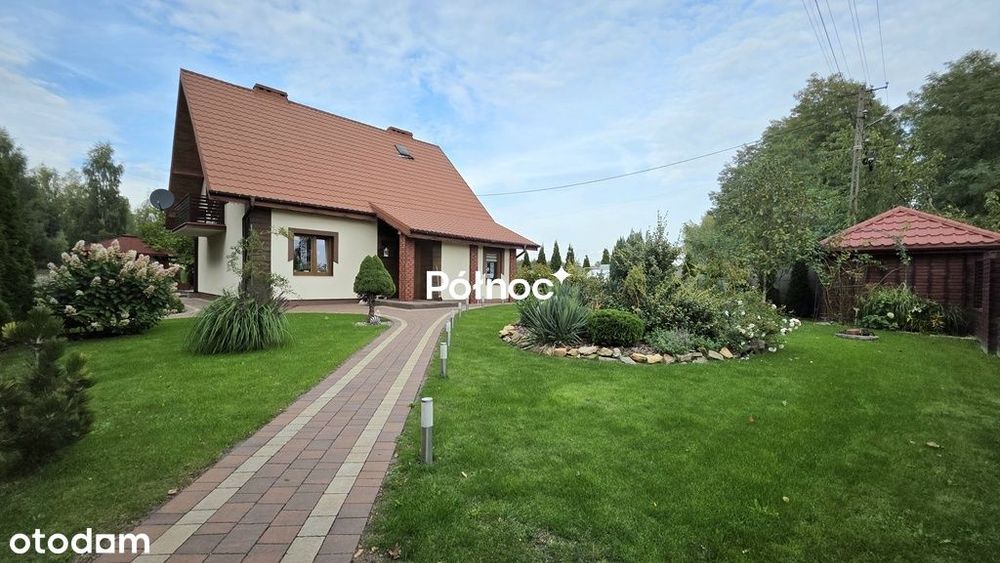 Dom w otoczeniu zieleni, Stużno