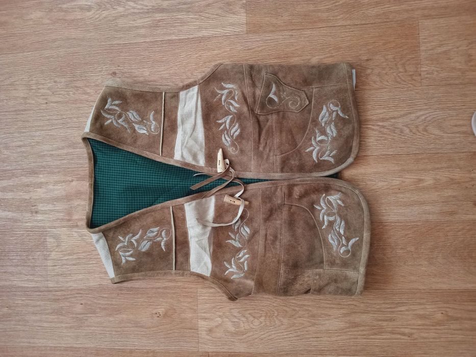 Вінтажна шкіряна жилетка безрукавка